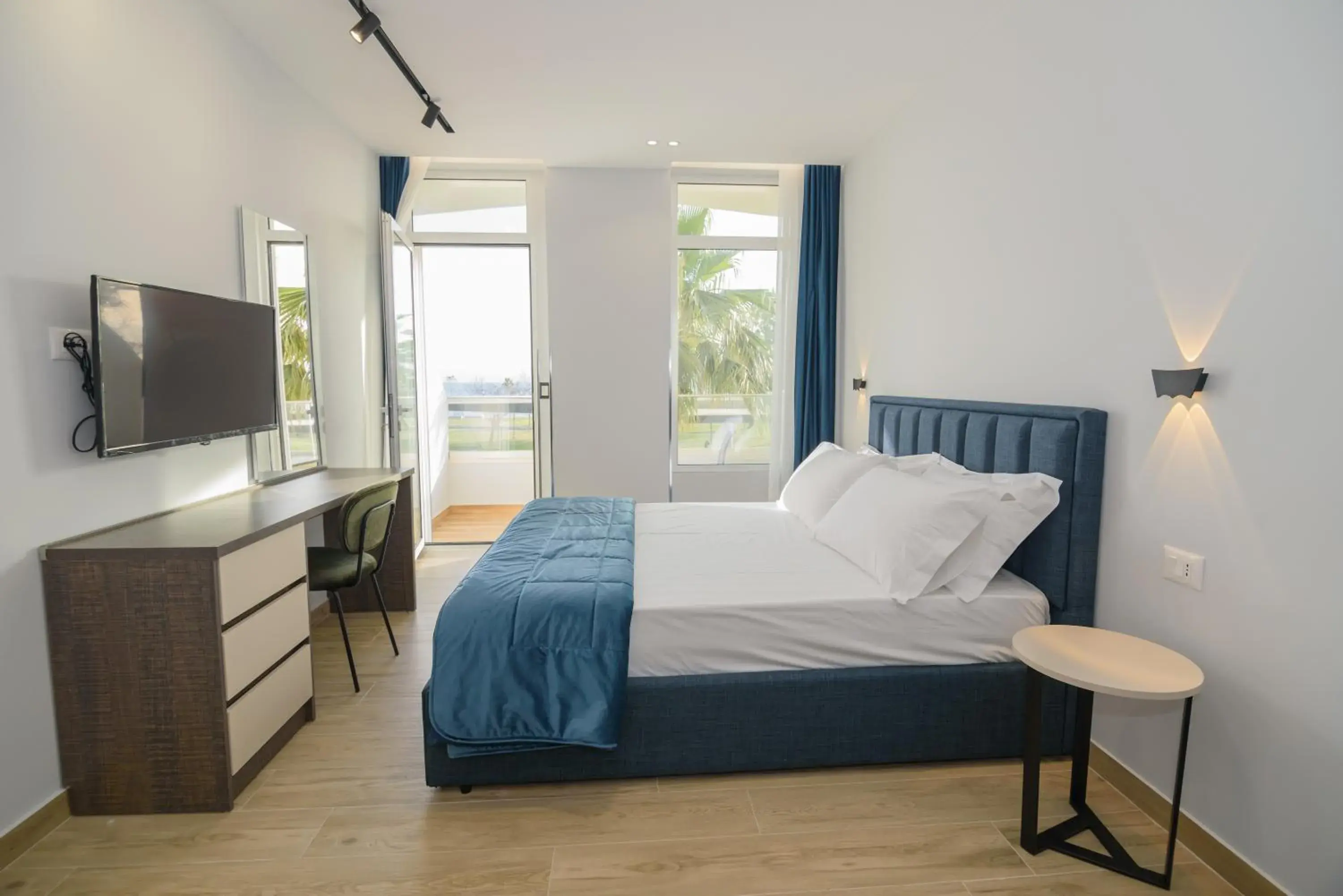 Quadruple Room with Sea View in Palm Side Hotel Quadruple Room with Sea View in Palm Side Hotel