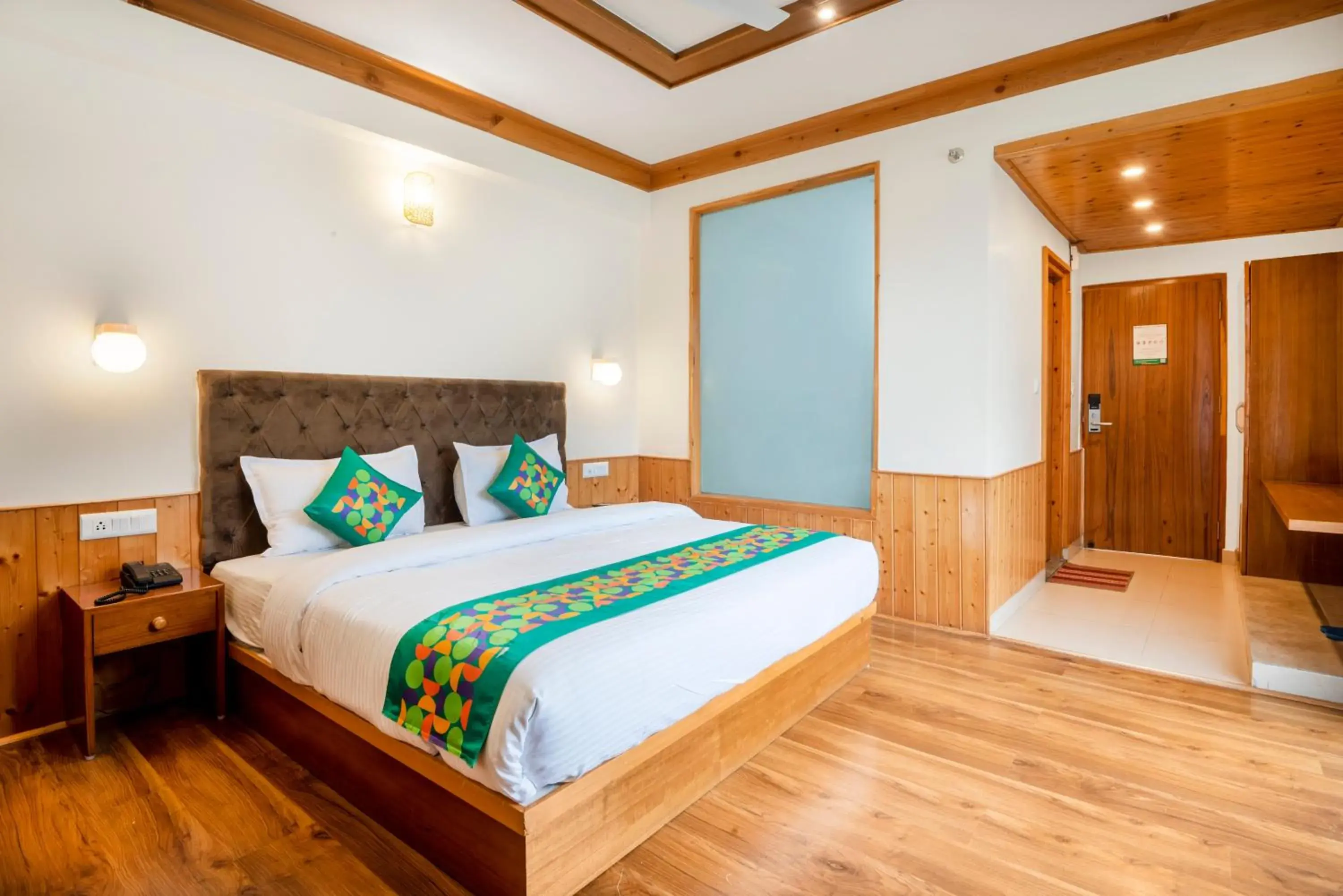 Deluxe Room With Balcony & Mountain View in Treebo Premium Sattva With Mountain View Deluxe Room With Balcony & Mountain View in Treebo Premium Sattva With Mountain View