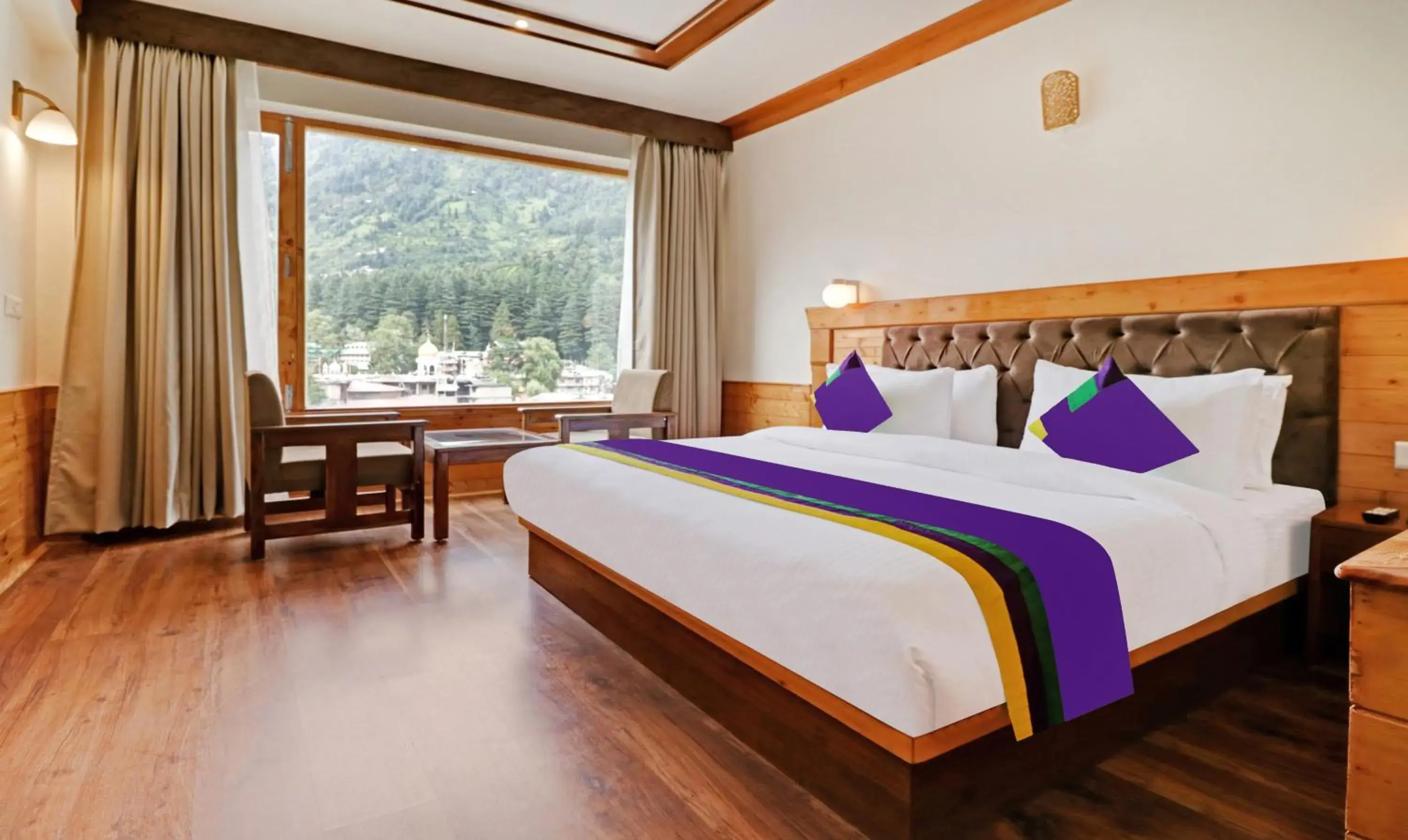 Standard Room With Mountain View in Treebo Premium Sattva With Mountain View Standard Room With Mountain View in Treebo Premium Sattva With Mountain View