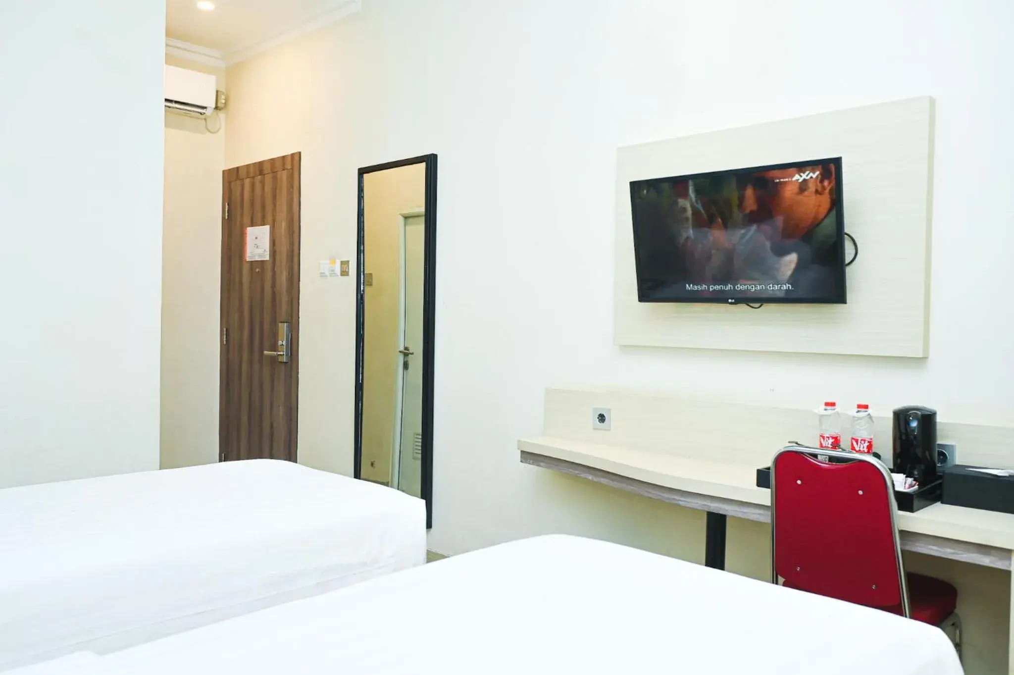 Superior Twin Room in Kesuma Front One Boutique Palembang Superior Twin Room in Kesuma Front One Boutique Palembang