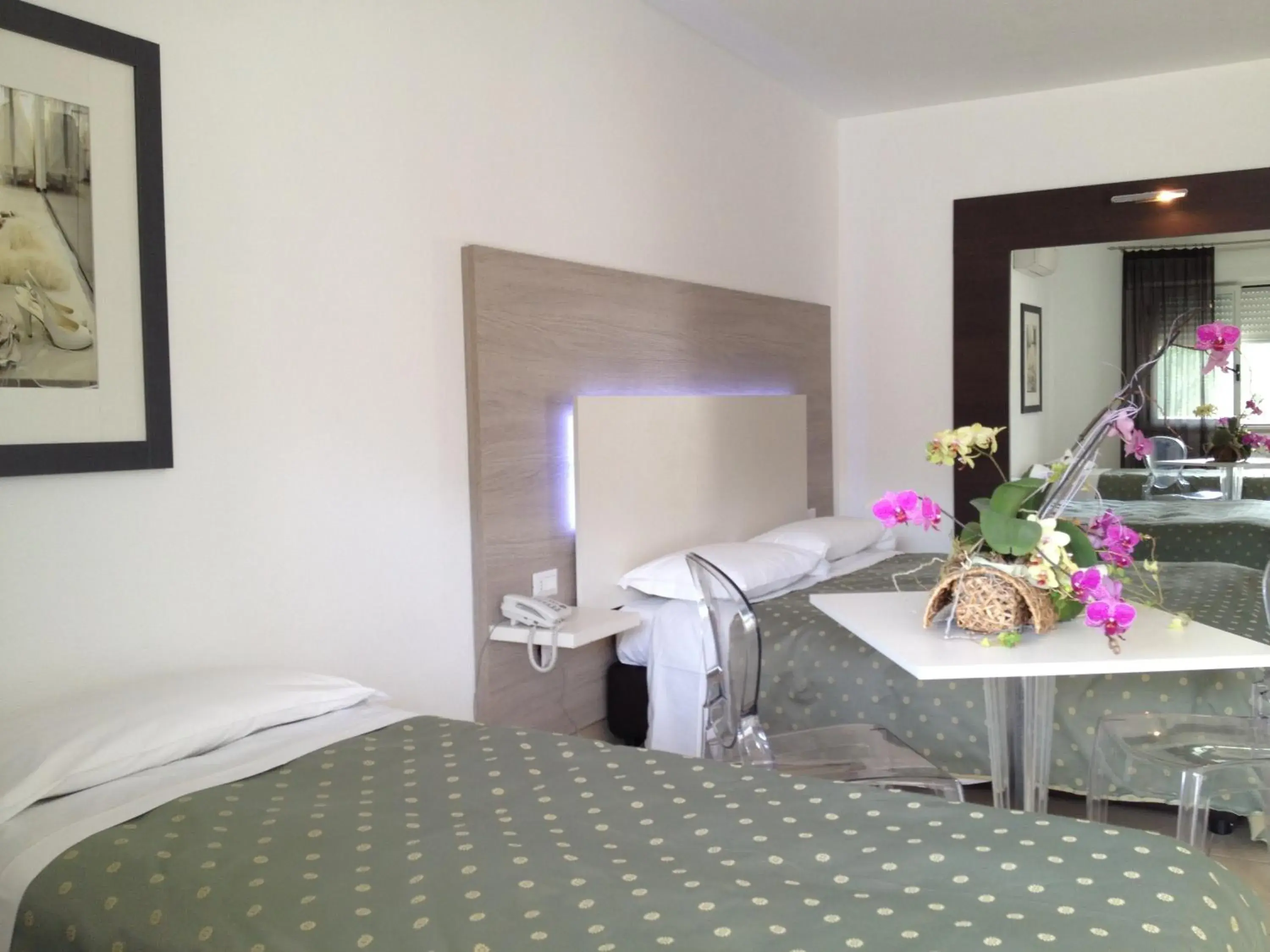 Superior Triple Room in Hotel Ambrosio La Corte Superior Triple Room in Hotel Ambrosio La Corte