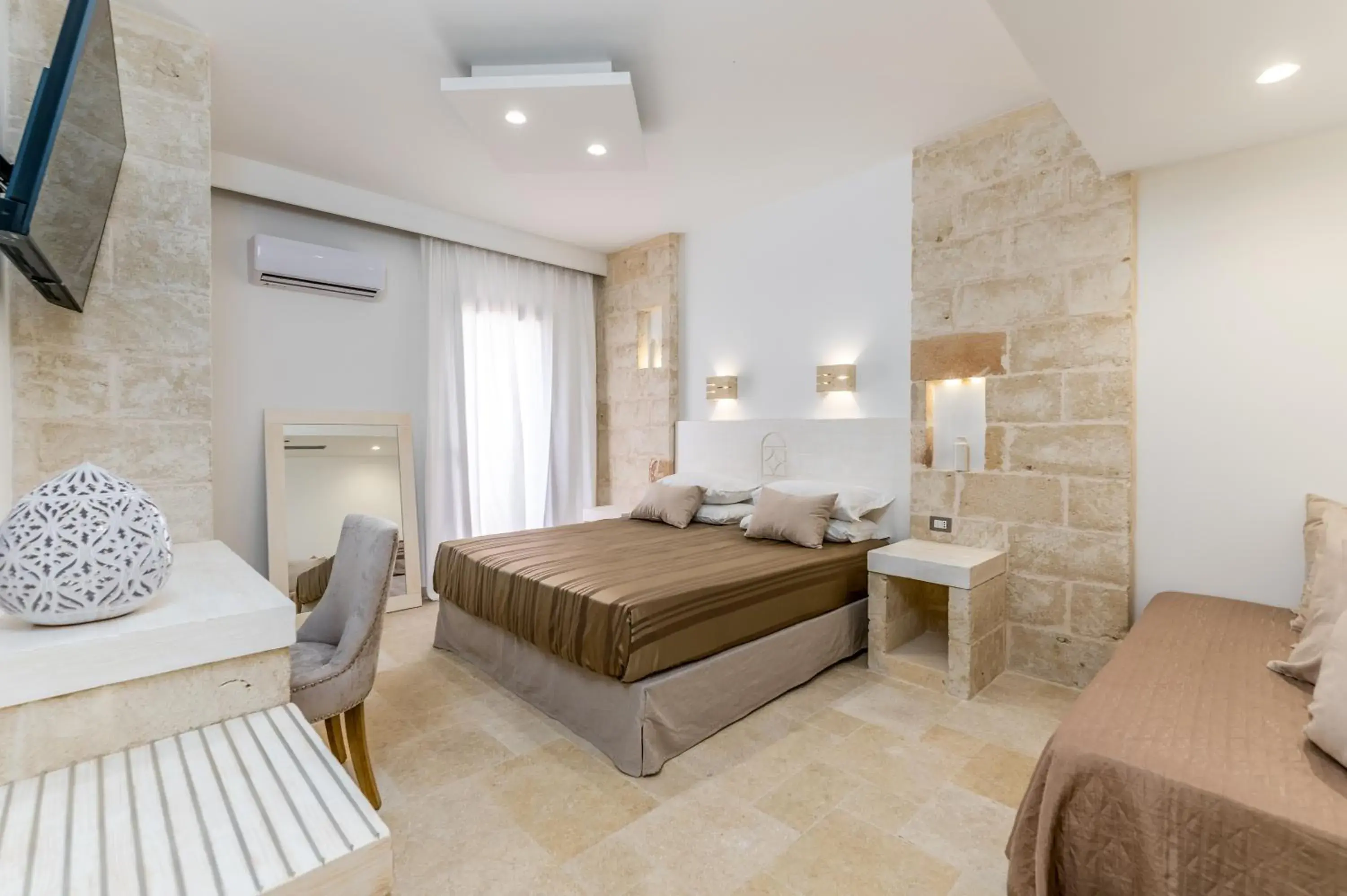 Superior Triple Room in Relais Porta del Sud Superior Triple Room in Relais Porta del Sud