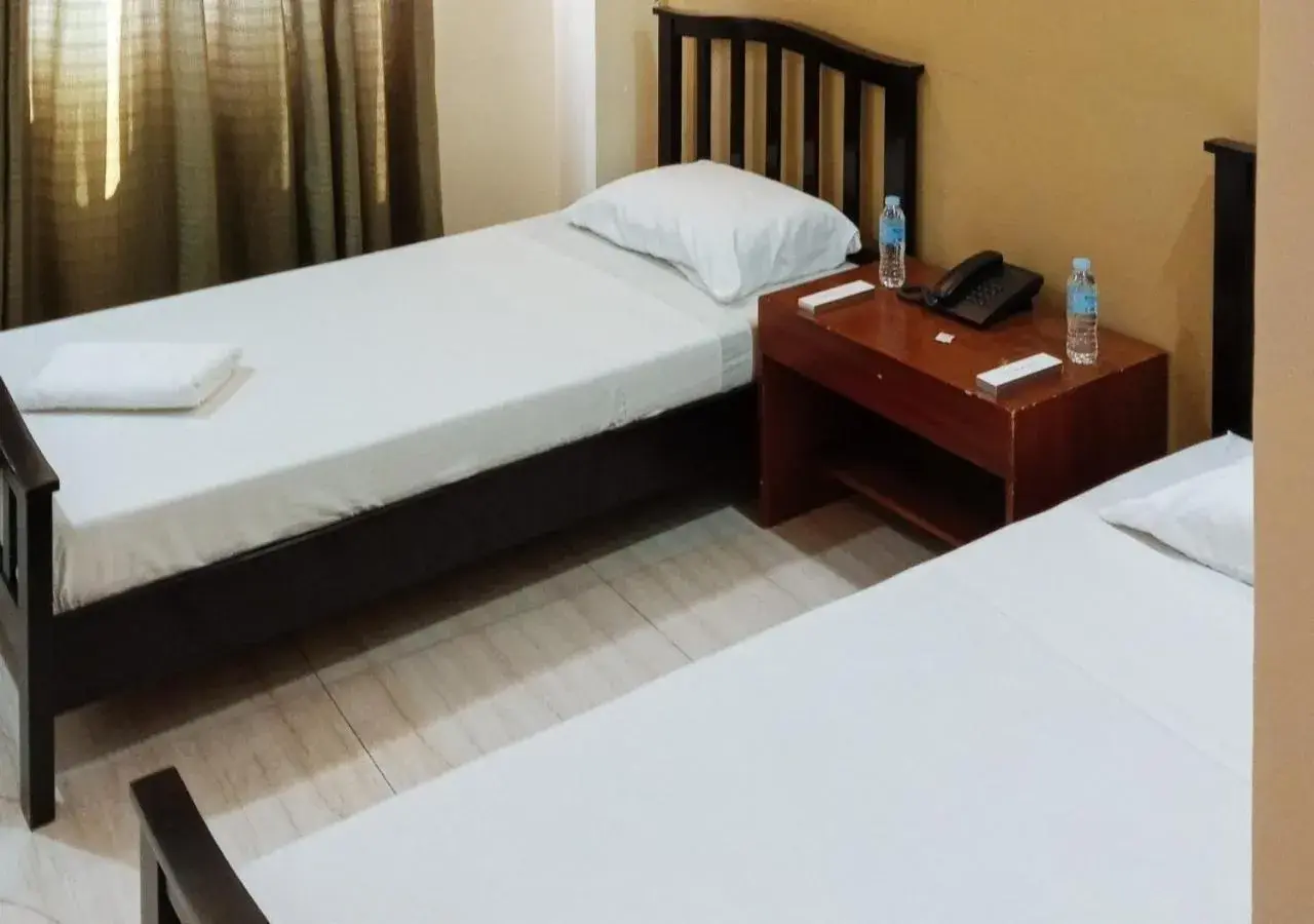 Twin Room in RedDoorz Plus @ Conclave Hotel Davao City Twin Room in RedDoorz Plus @ Conclave Hotel Davao City