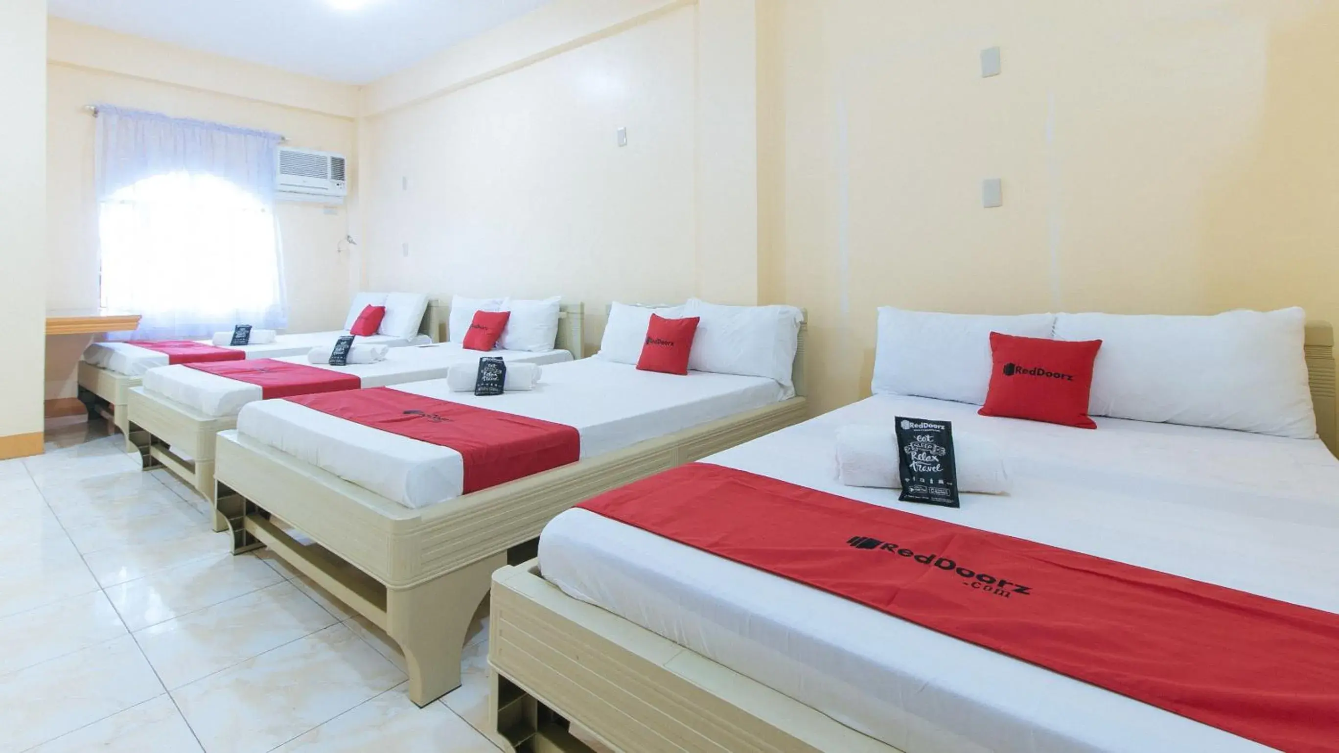 Deluxe Family Room in RedDoorz @ Goldland Spring Resort Urdaneta City Deluxe Family Room in RedDoorz @ Goldland Spring Resort Urdaneta City