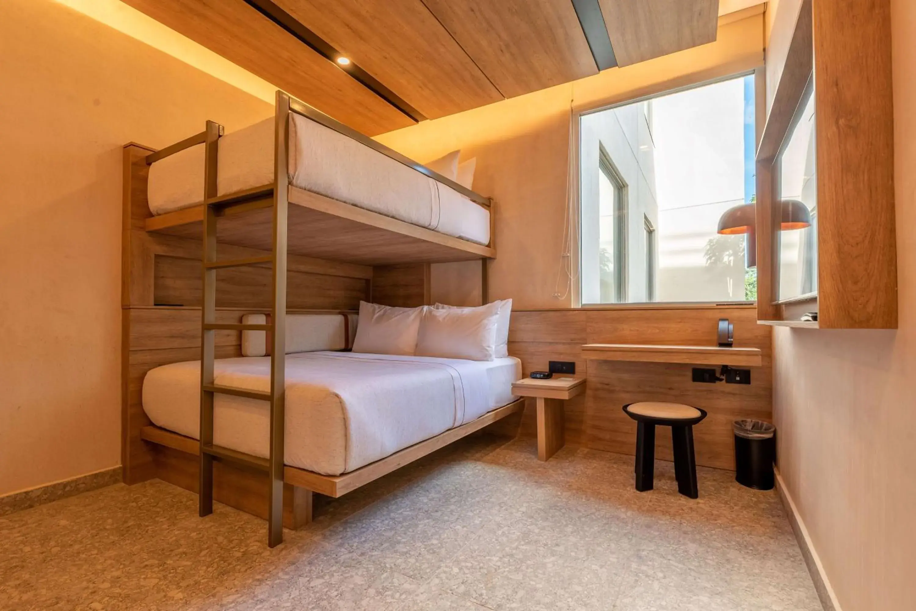 Room with Bunk Beds-One Twin Bed over One Queen Bed in Motto By Hilton Tulum Room with Bunk Beds-One Twin Bed over One Queen Bed in Motto By Hilton Tulum