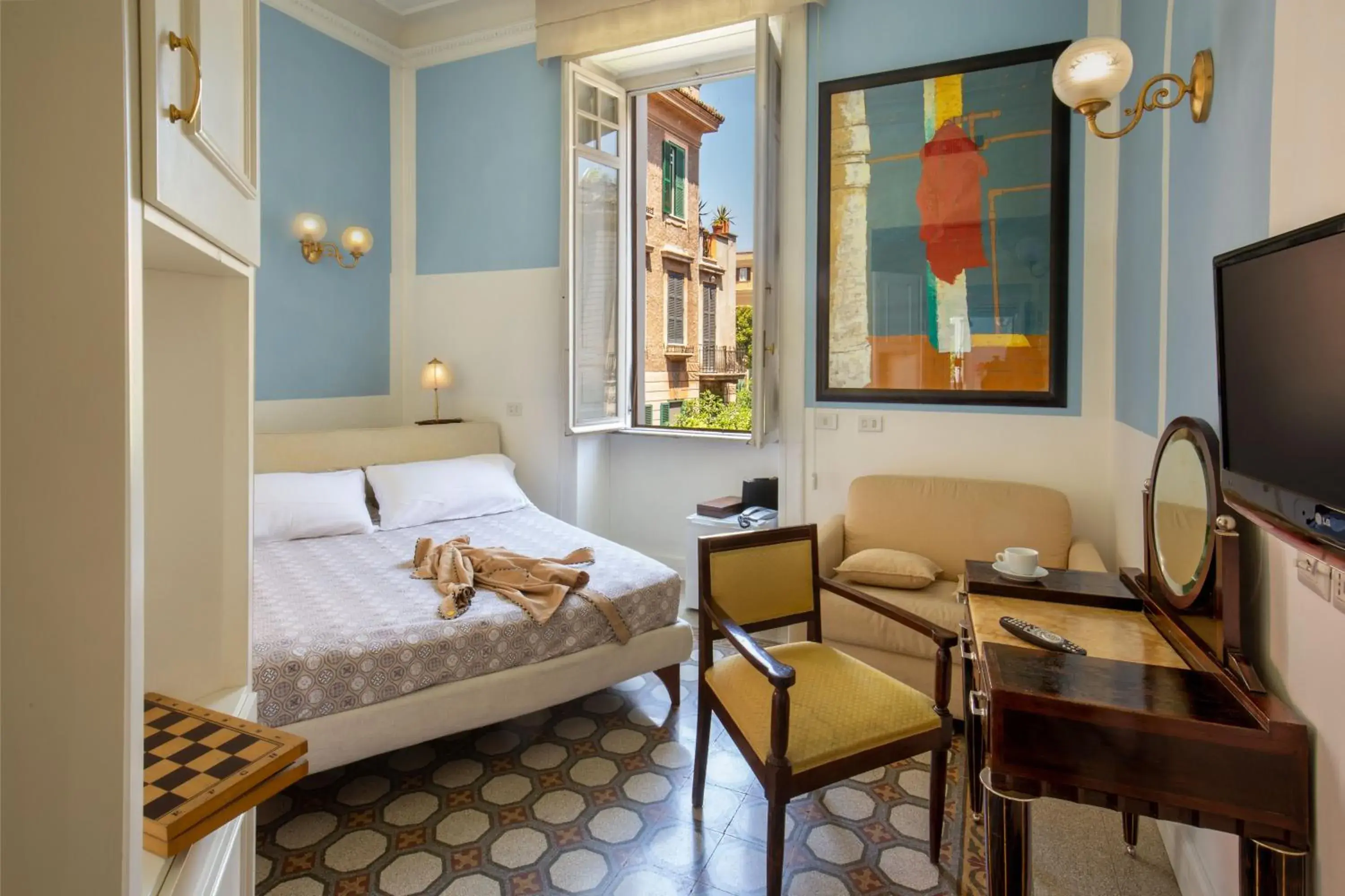 Triple Room in Hotel Emona Aquaeductus Triple Room in Hotel Emona Aquaeductus