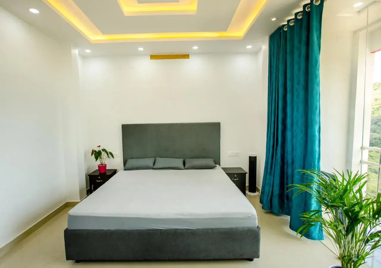 Deluxe Double Room with Balcony in Hidden Valley Hill View Cottage Vagamon by VOYE HOMES - Rooms with Valley View Deluxe Double Room with Balcony in Hidden Valley Hill View Cottage Vagamon by VOYE HOMES - Rooms with Valley View
