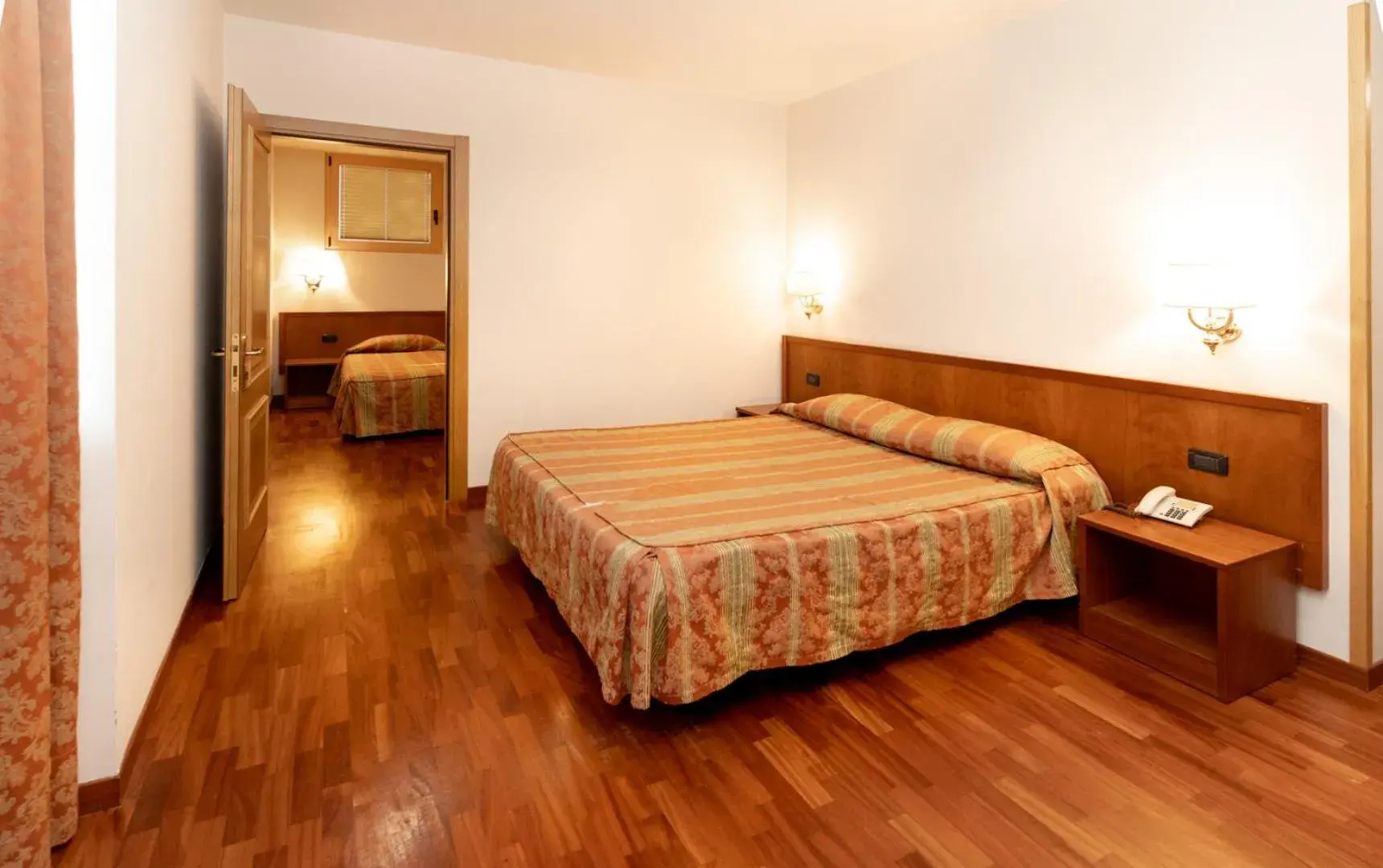 Quadruple Room in Hotel Tivoli Quadruple Room in Hotel Tivoli