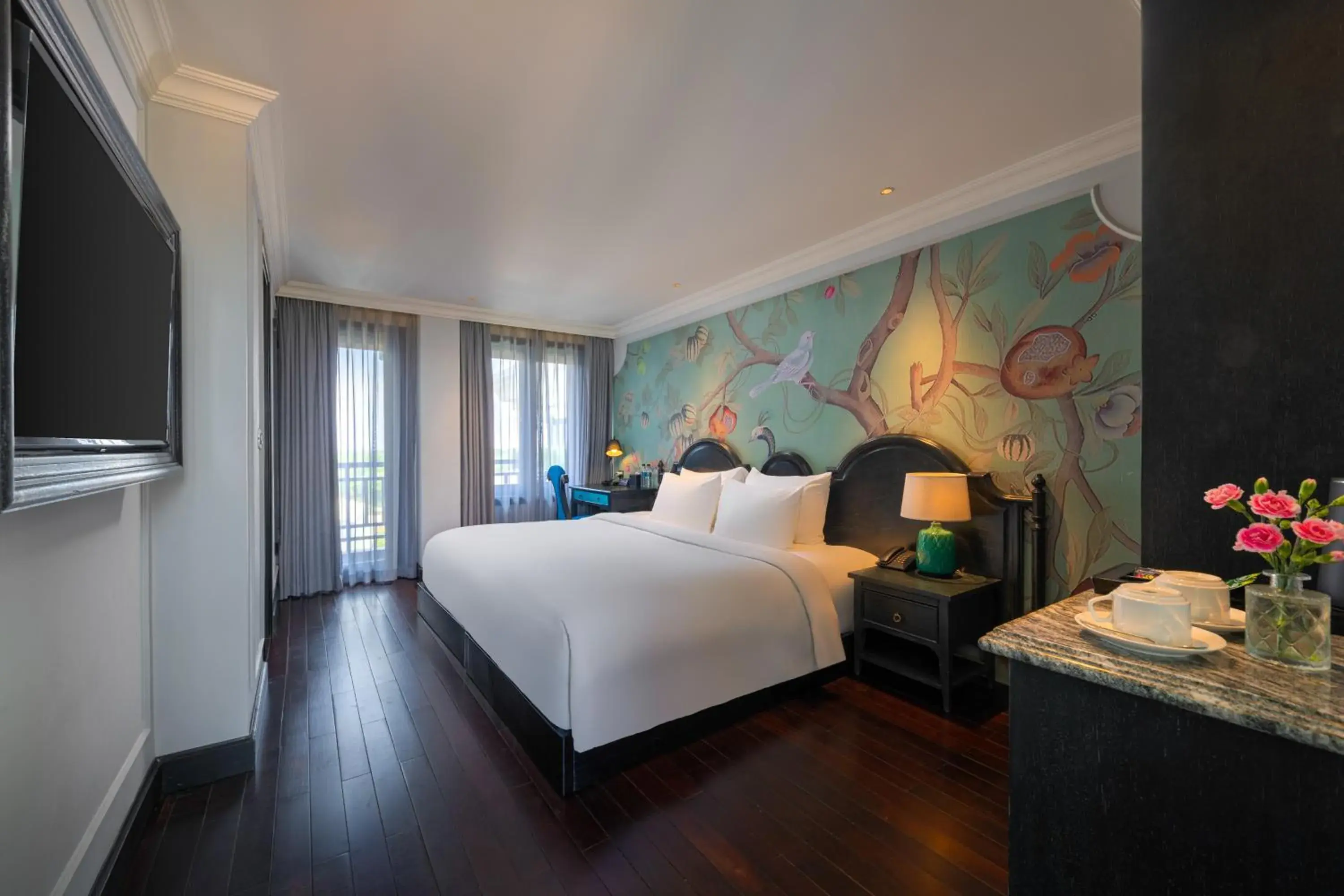 Deluxe Balcony with Pool View in Hoi An Delicacy Hotel & Spa Deluxe Balcony with Pool View in Hoi An Delicacy Hotel & Spa