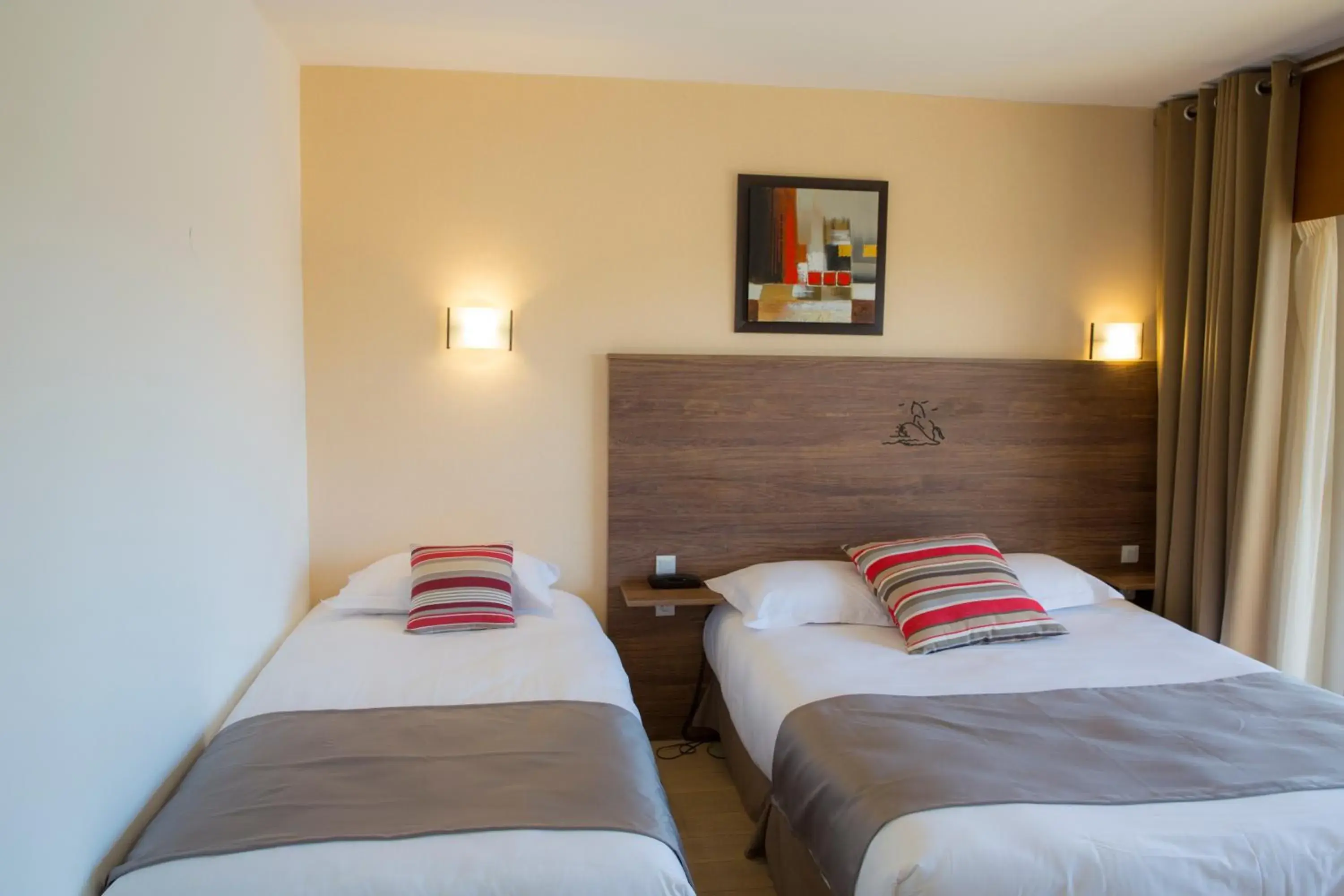 Triple Room with Balcony and Garden View in Arc Hôtel Sur Mer Triple Room with Balcony and Garden View in Arc Hôtel Sur Mer