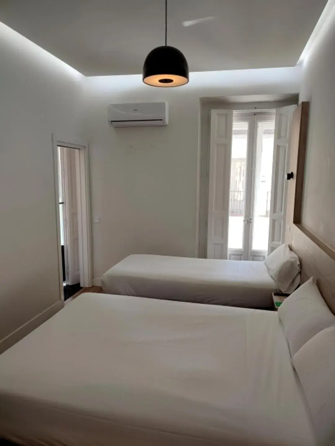 Triple Room in Hostal Manuela by gaiarooms Triple Room in Hostal Manuela by gaiarooms