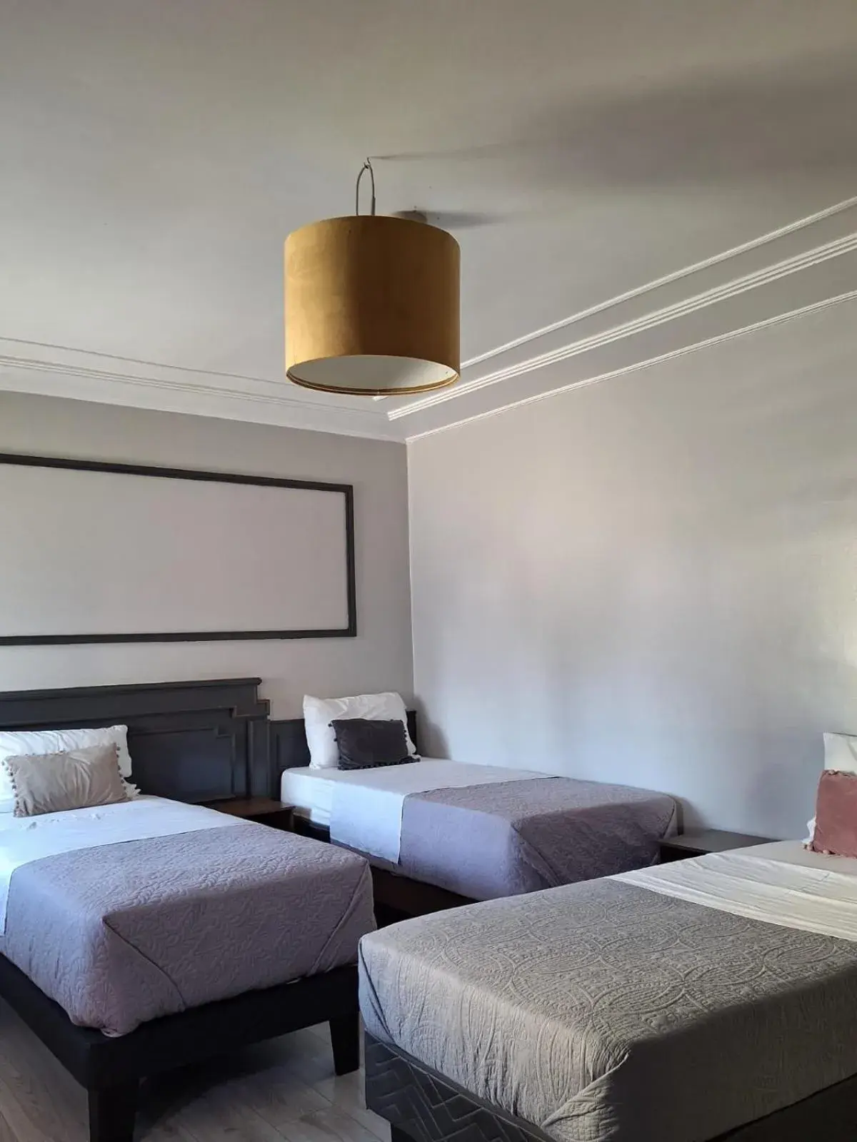 Superior Triple Room in Hotel Asturias Superior Triple Room in Hotel Asturias