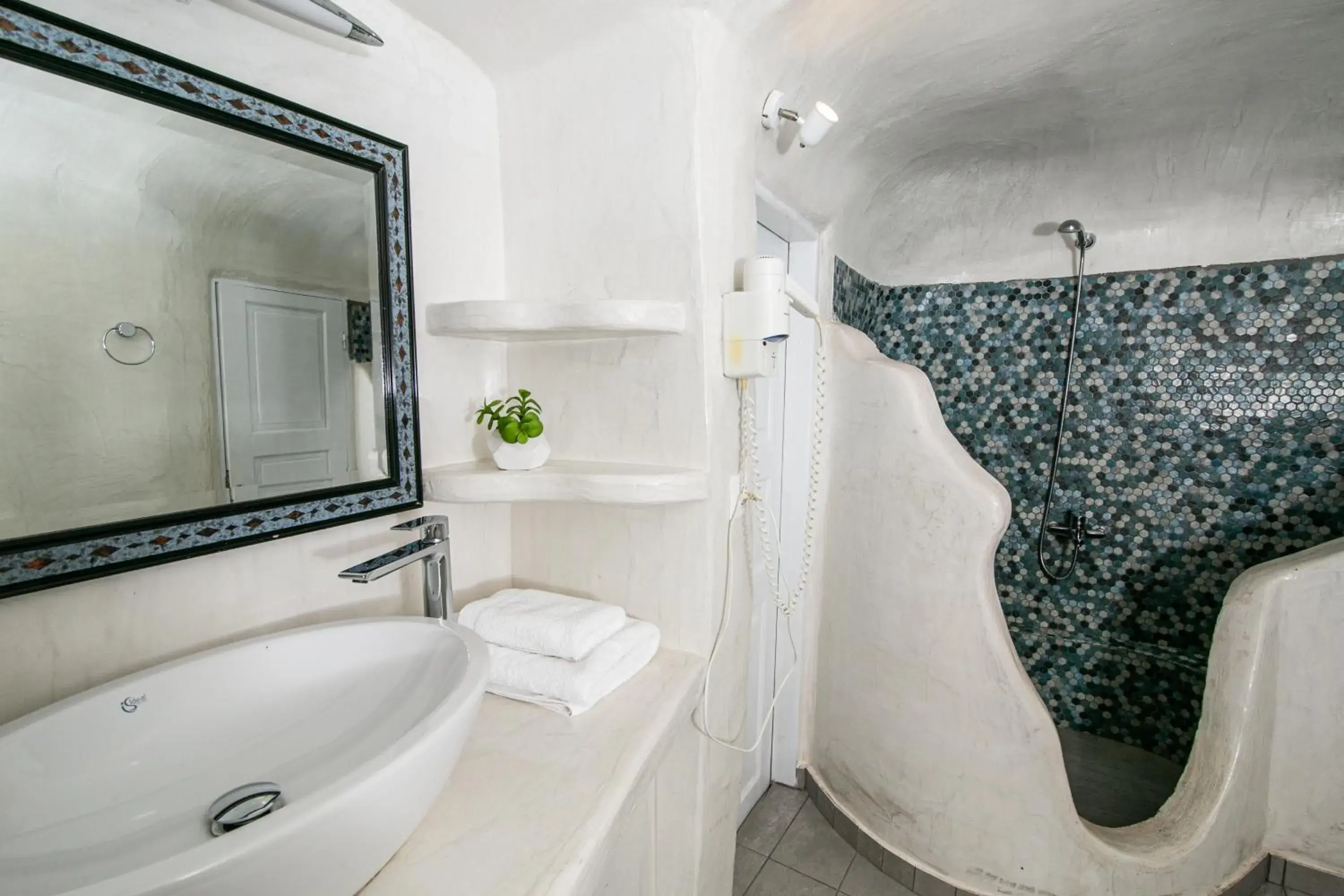 Honeymoon Cave Suite with Hot Tub and Caldera & Sea View in Vogue Suites Honeymoon Cave Suite with Hot Tub and Caldera & Sea View in Vogue Suites