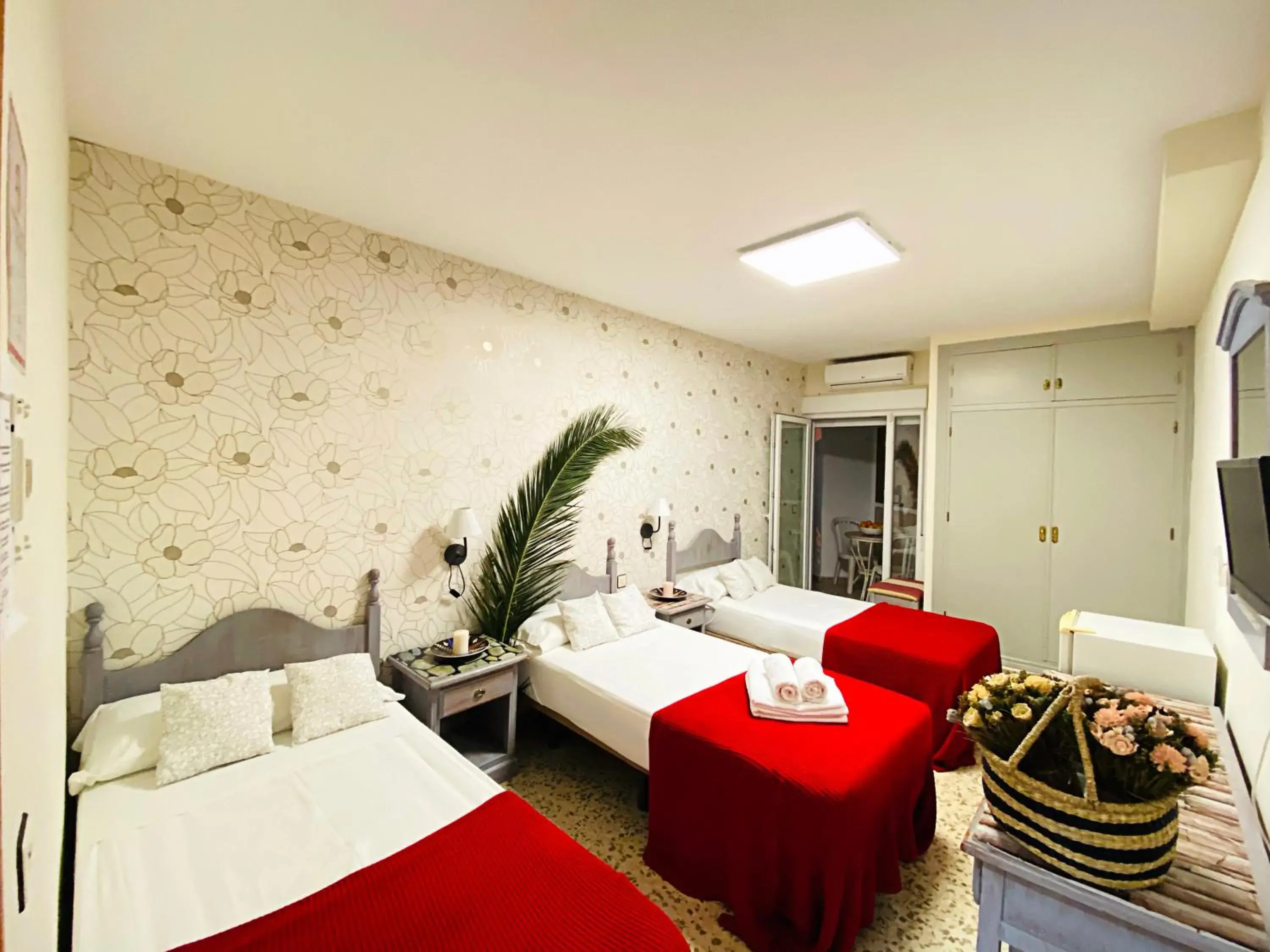 Triple Room in Hostal Azahara Triple Room in Hostal Azahara