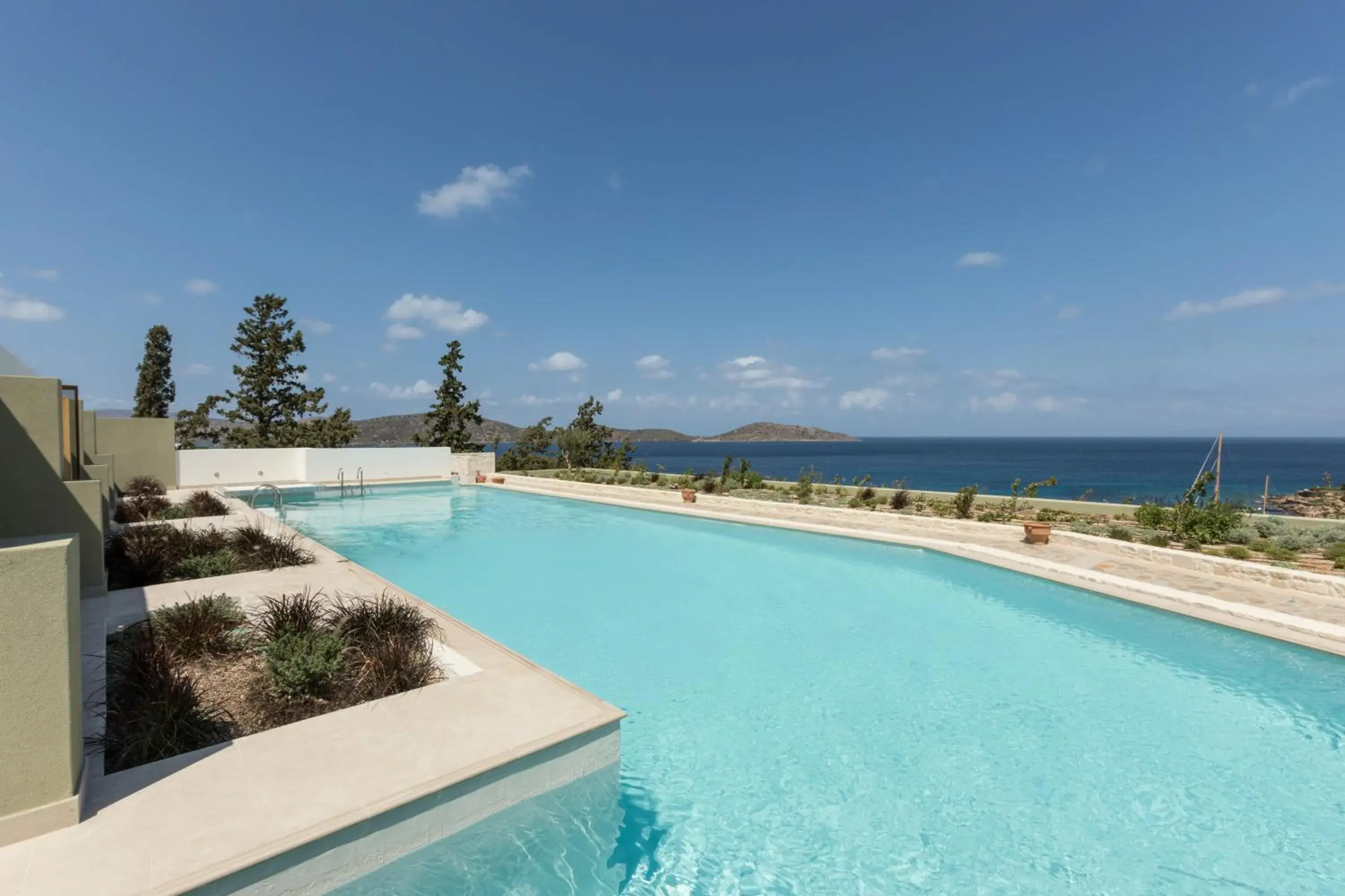 Premium Junior Suite Shared Pool in Porto Elounda Golf & Spa Resort, Six Senses Spa Premium Junior Suite Shared Pool in Porto Elounda Golf & Spa Resort, Six Senses Spa