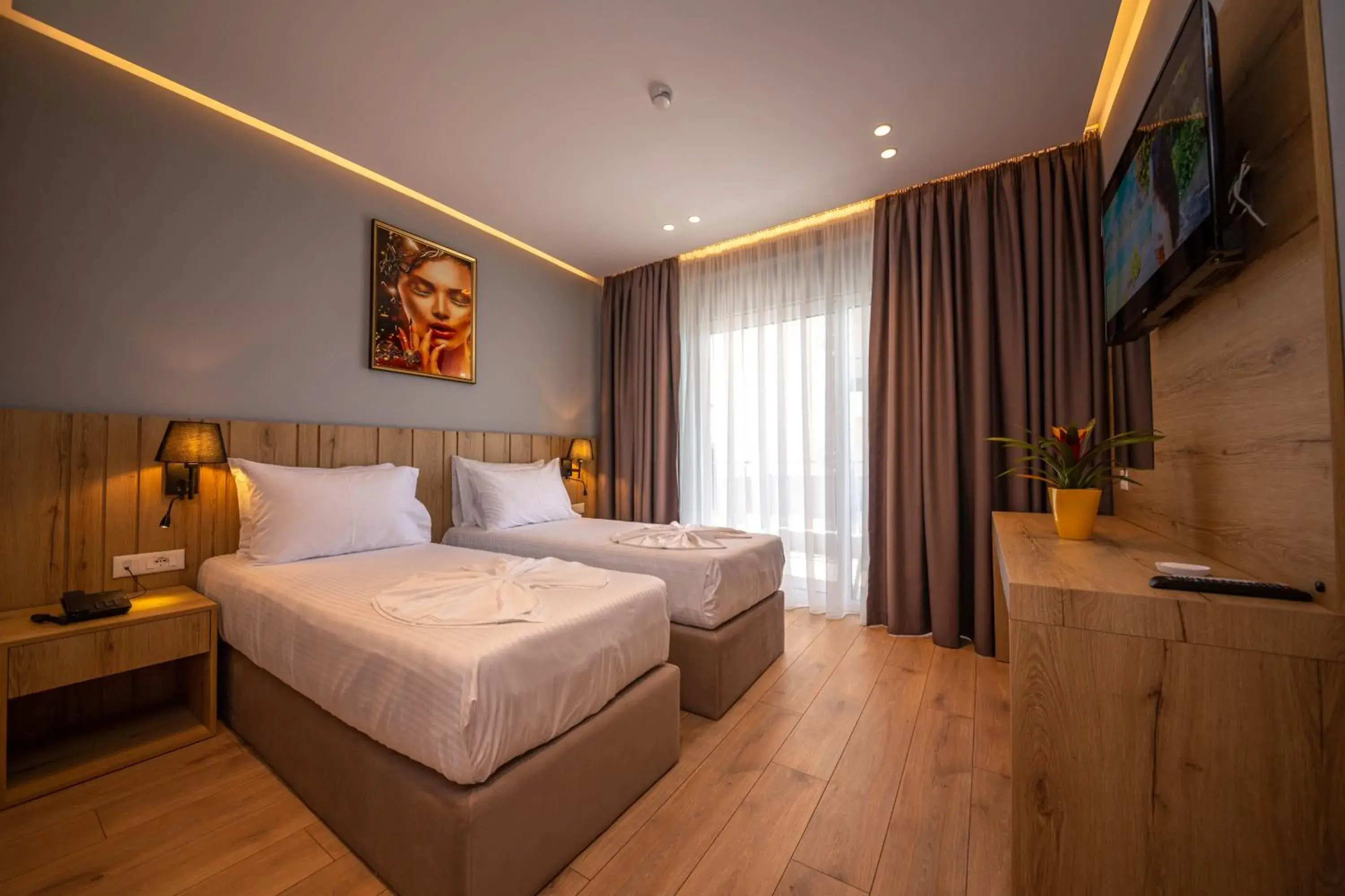 Deluxe Double or Twin Room with Balcony and Side Sea View in Azure Inn Hotel Deluxe Double or Twin Room with Balcony and Side Sea View in Azure Inn Hotel