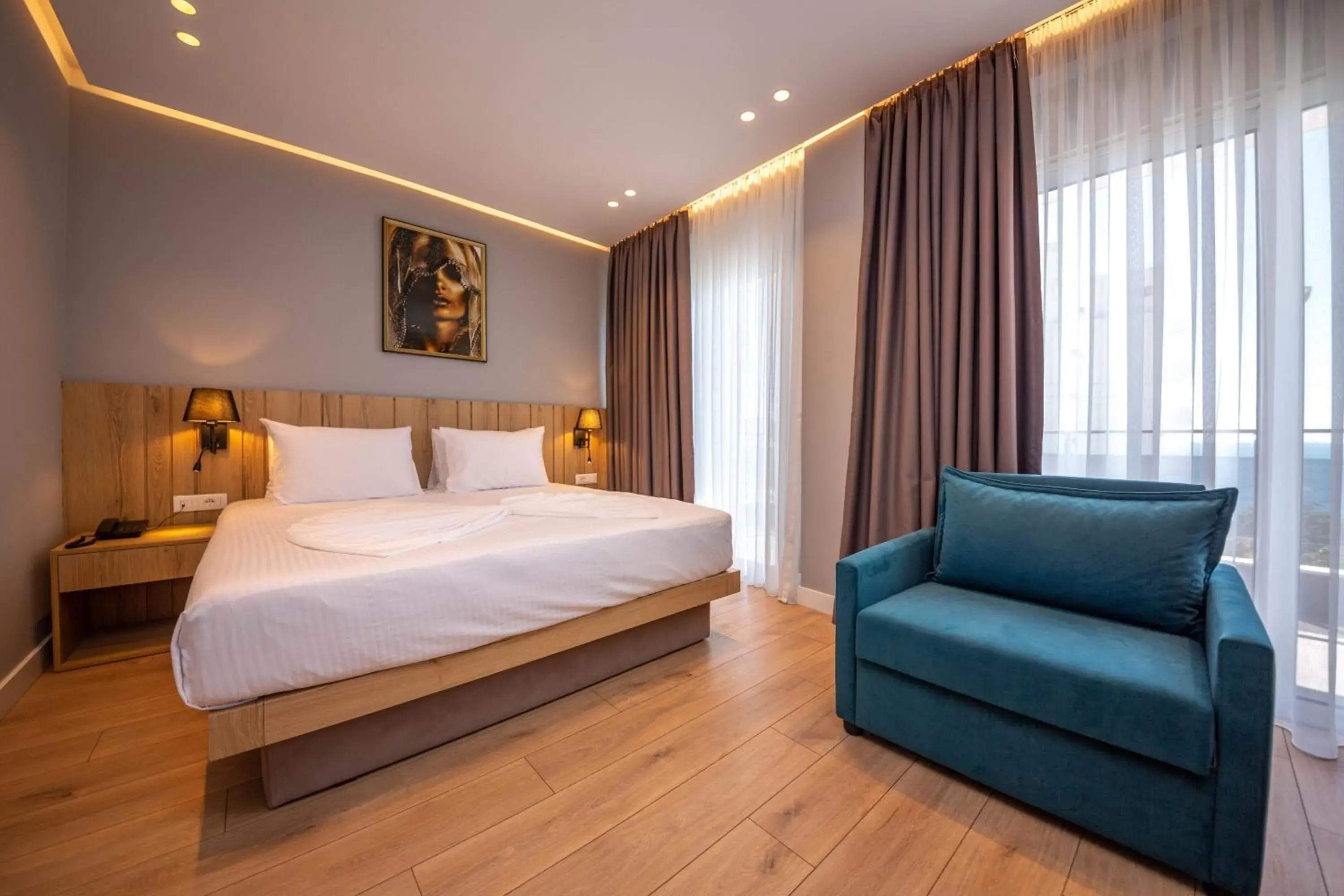 Deluxe Double + Sofa Bed with Balcony and Sea View in Azure Inn Hotel Deluxe Double + Sofa Bed with Balcony and Sea View in Azure Inn Hotel