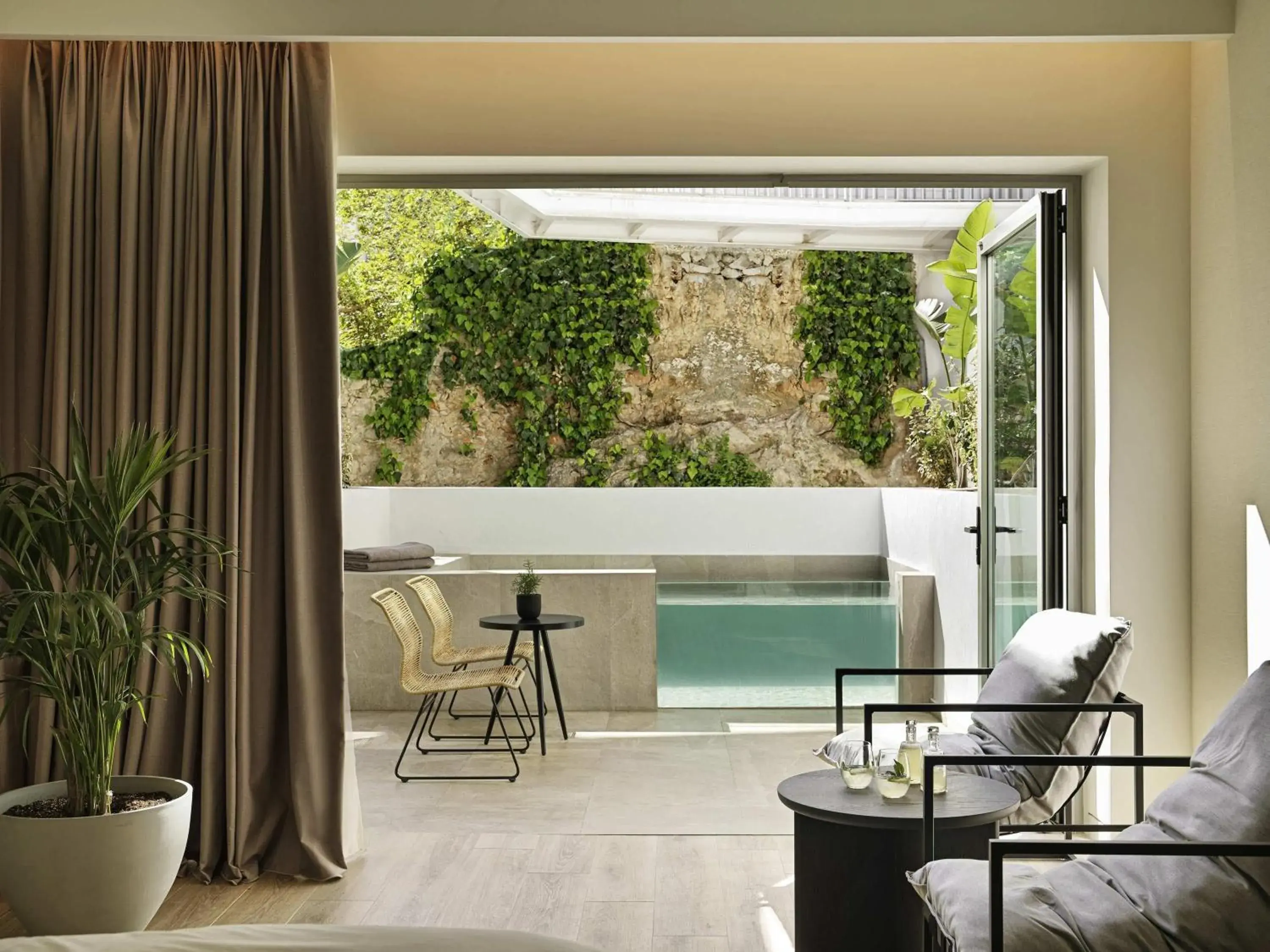 Junior Suite with Plunge Pool and Atrium View in NIKO Seaside Resort MGallery Junior Suite with Plunge Pool and Atrium View in NIKO Seaside Resort MGallery