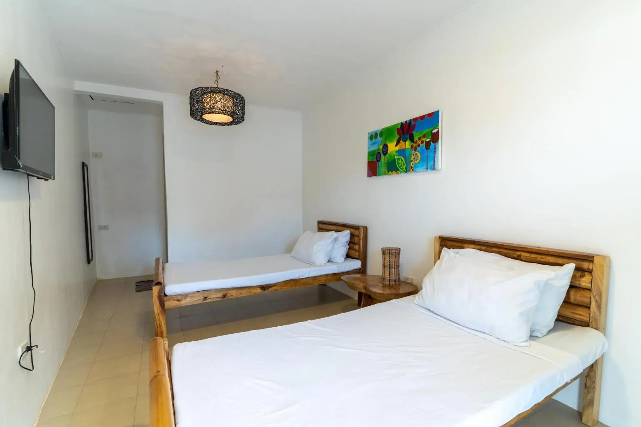 Deluxe Twin Room with Sea View in Bamboo Paraiso Resort at Bolo Beach Deluxe Twin Room with Sea View in Bamboo Paraiso Resort at Bolo Beach