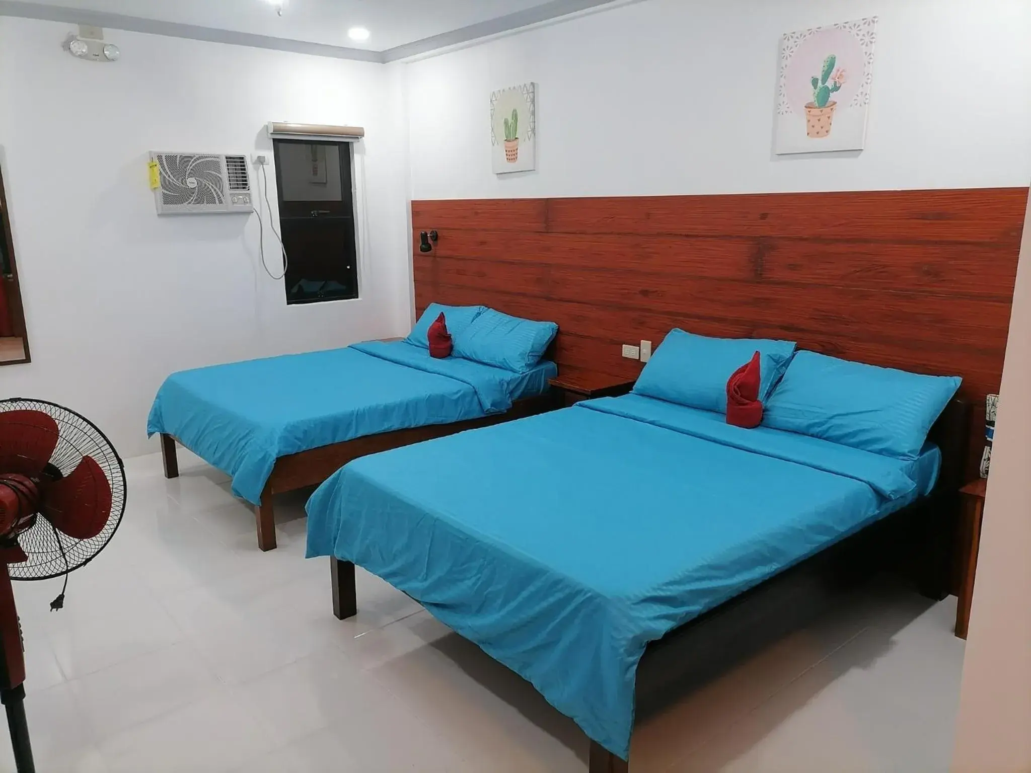 Quadruple Room with Balcony in La Bella Swiss Inn Quadruple Room with Balcony in La Bella Swiss Inn