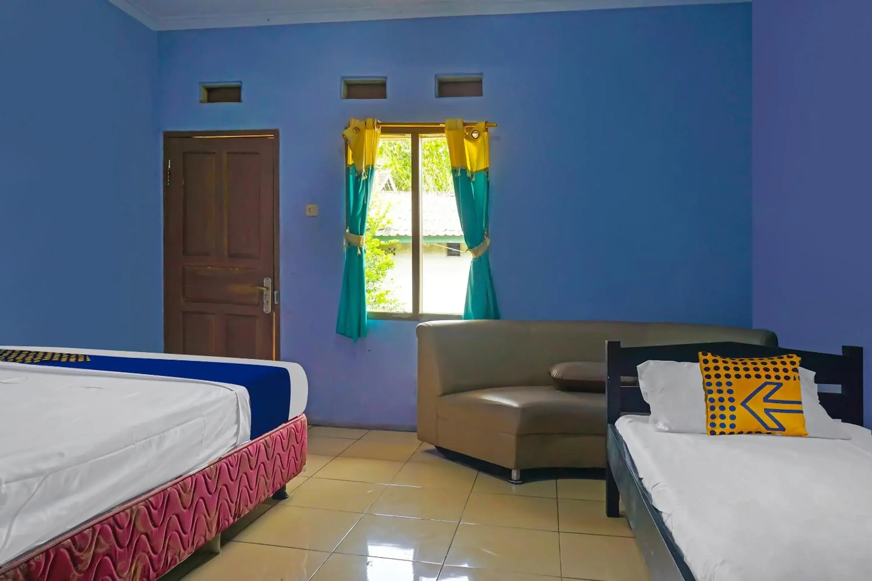 Economy Triple Room in Hotel O Penginapan Berkah Mandiri Syariah Economy Triple Room in Hotel O Penginapan Berkah Mandiri Syariah