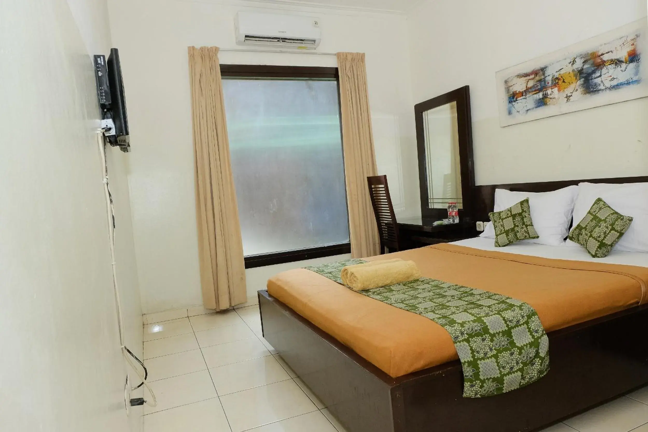 Superior Double Room in The Kirana Purnama Semarang Superior Double Room in The Kirana Purnama Semarang
