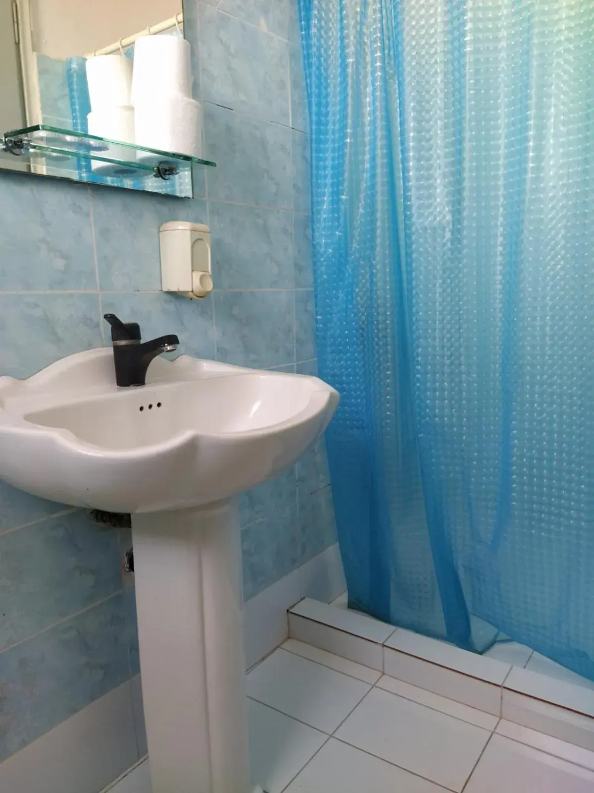 Quadruple Room in Delfini Hotel Quadruple Room in Delfini Hotel