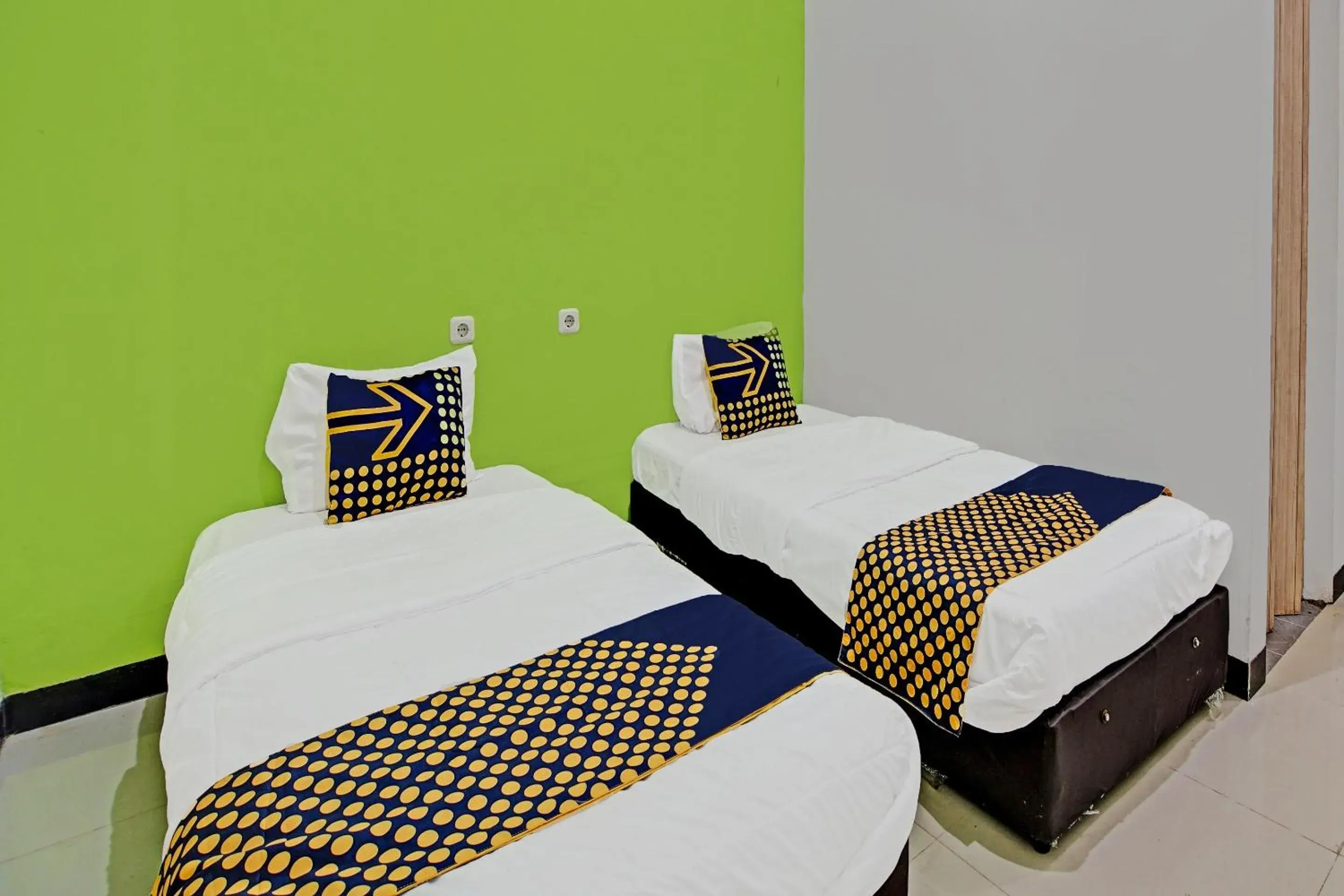 Economy Twin Room in Hotel O Lucky Guesthouse Economy Twin Room in Hotel O Lucky Guesthouse