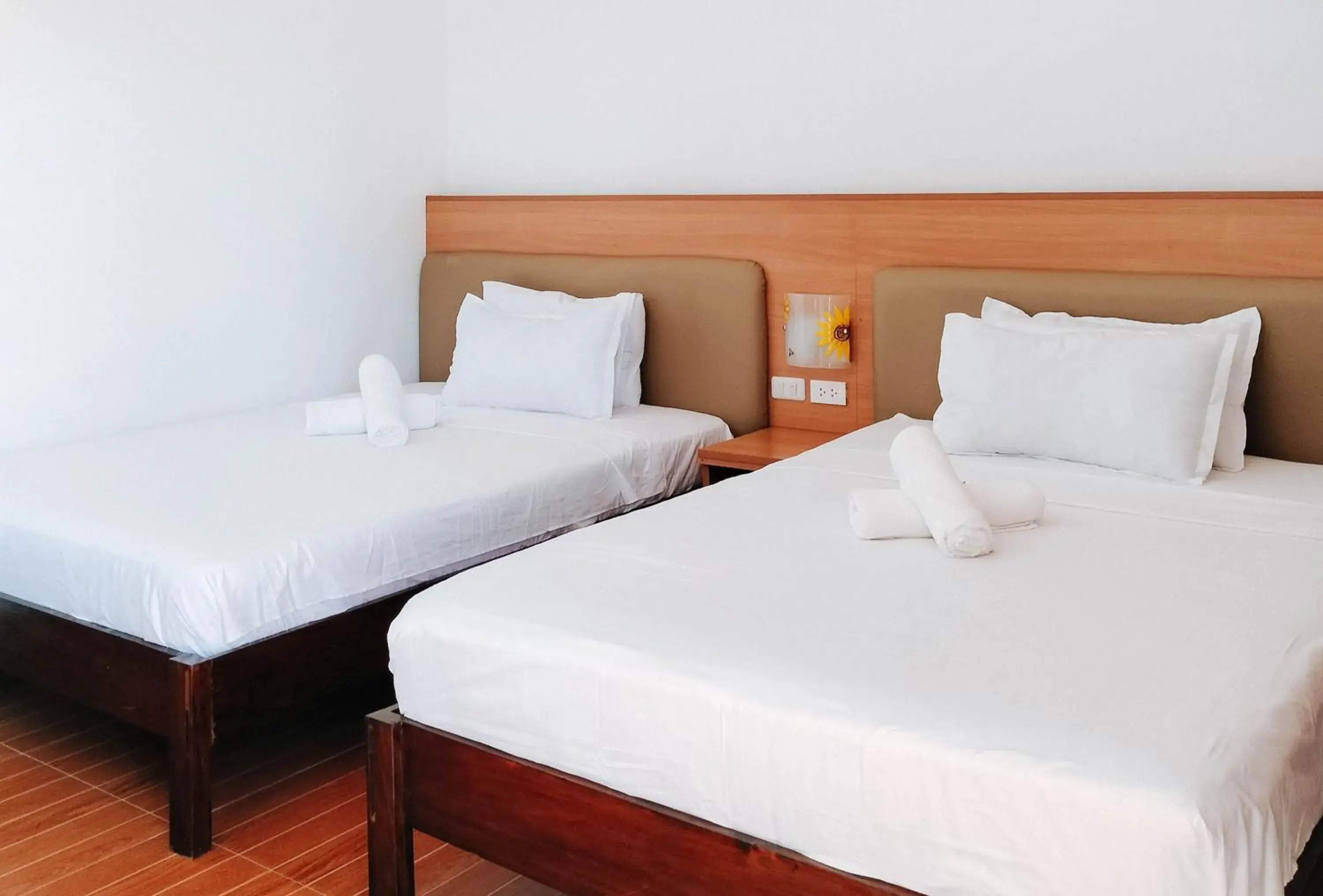 Family Room in RedDoorz @ Sun Kissed Resort Guindulman Family Room in RedDoorz @ Sun Kissed Resort Guindulman