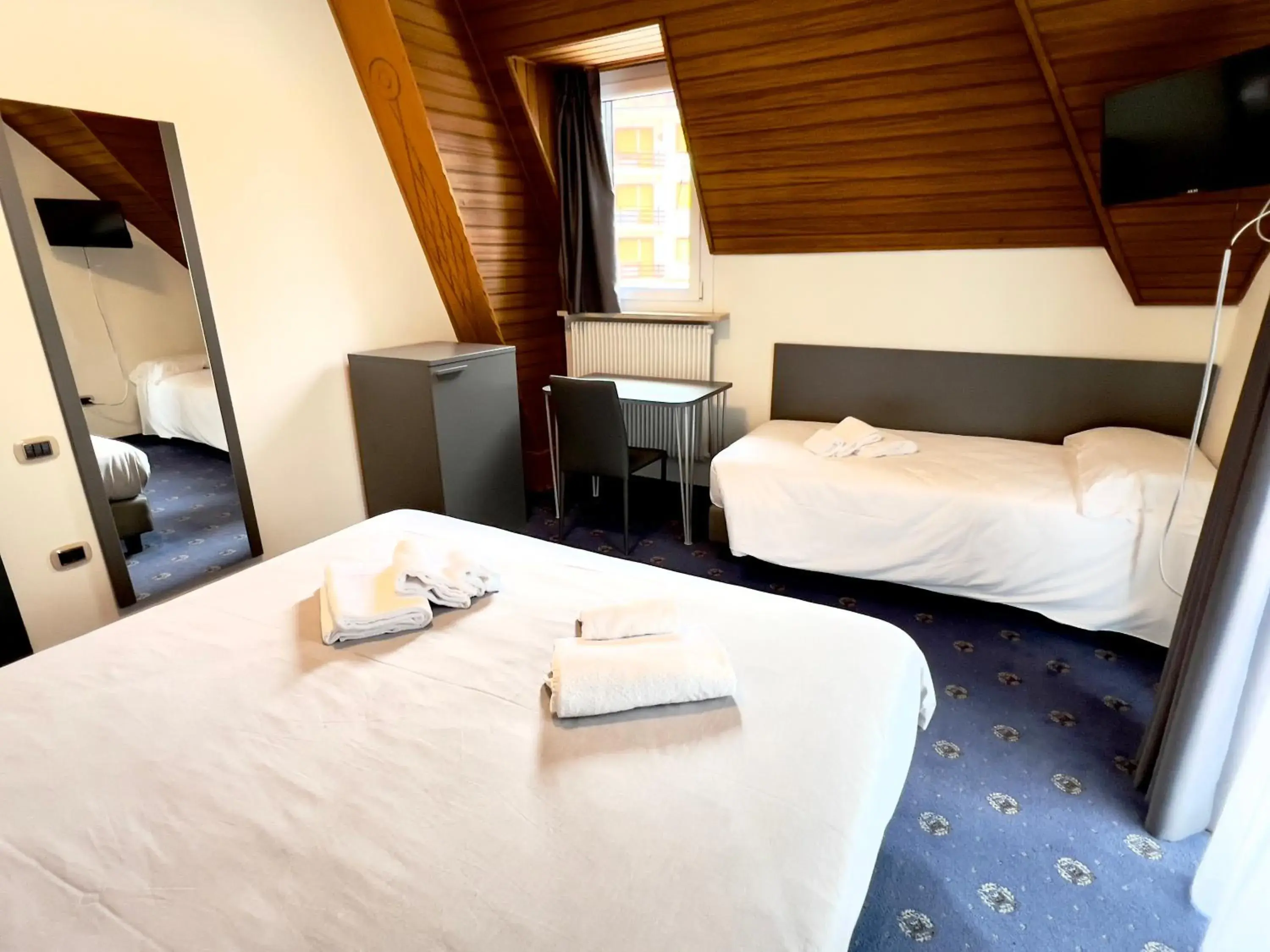 Superior Triple Room in Hotel Regina del Bosco Superior Triple Room in Hotel Regina del Bosco