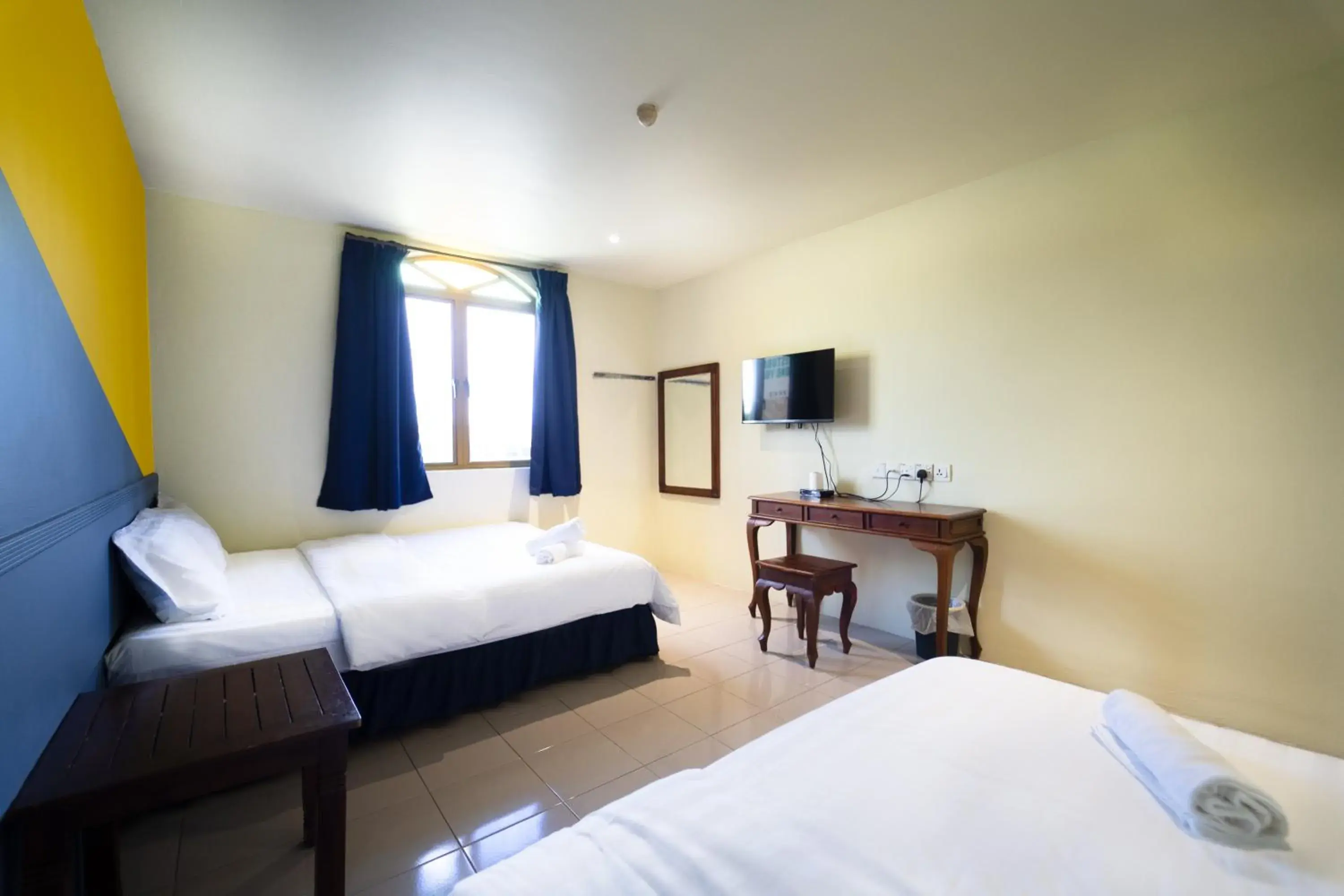 Triple Room in The Colony by Cactus Hotel Dedap Triple Room in The Colony by Cactus Hotel Dedap