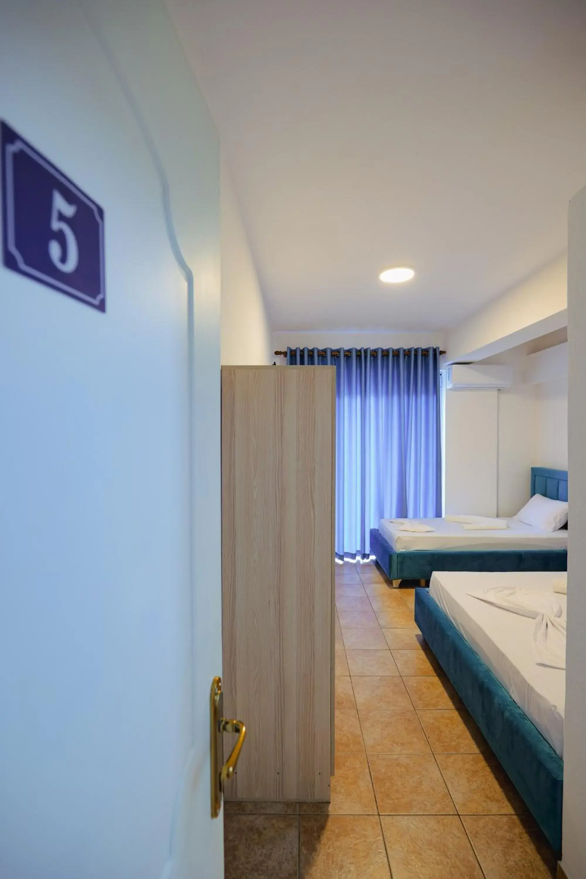 Triple Room with Balcony in Mema Rooms Triple Room with Balcony in Mema Rooms