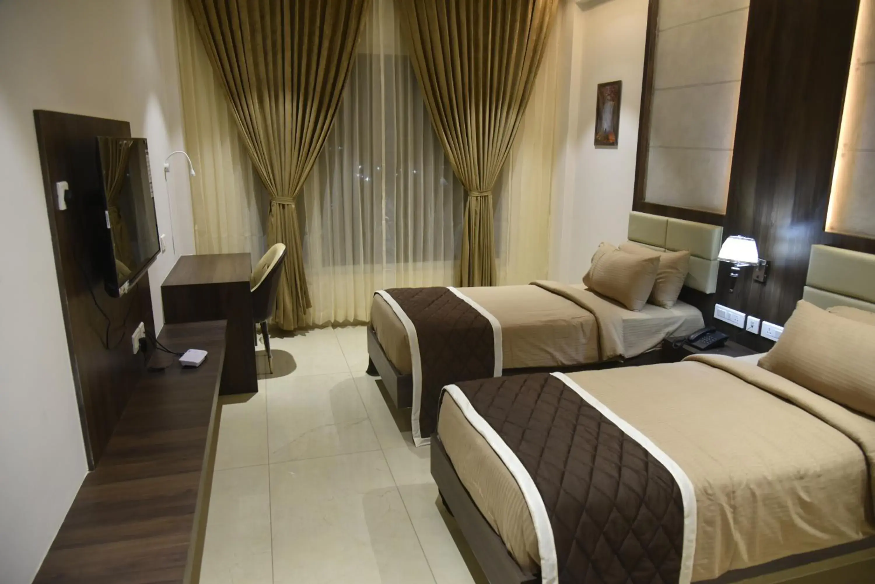 Deluxe Double Room with Two Double Beds in HOTEL VAHINI GRAND Deluxe Double Room with Two Double Beds in HOTEL VAHINI GRAND