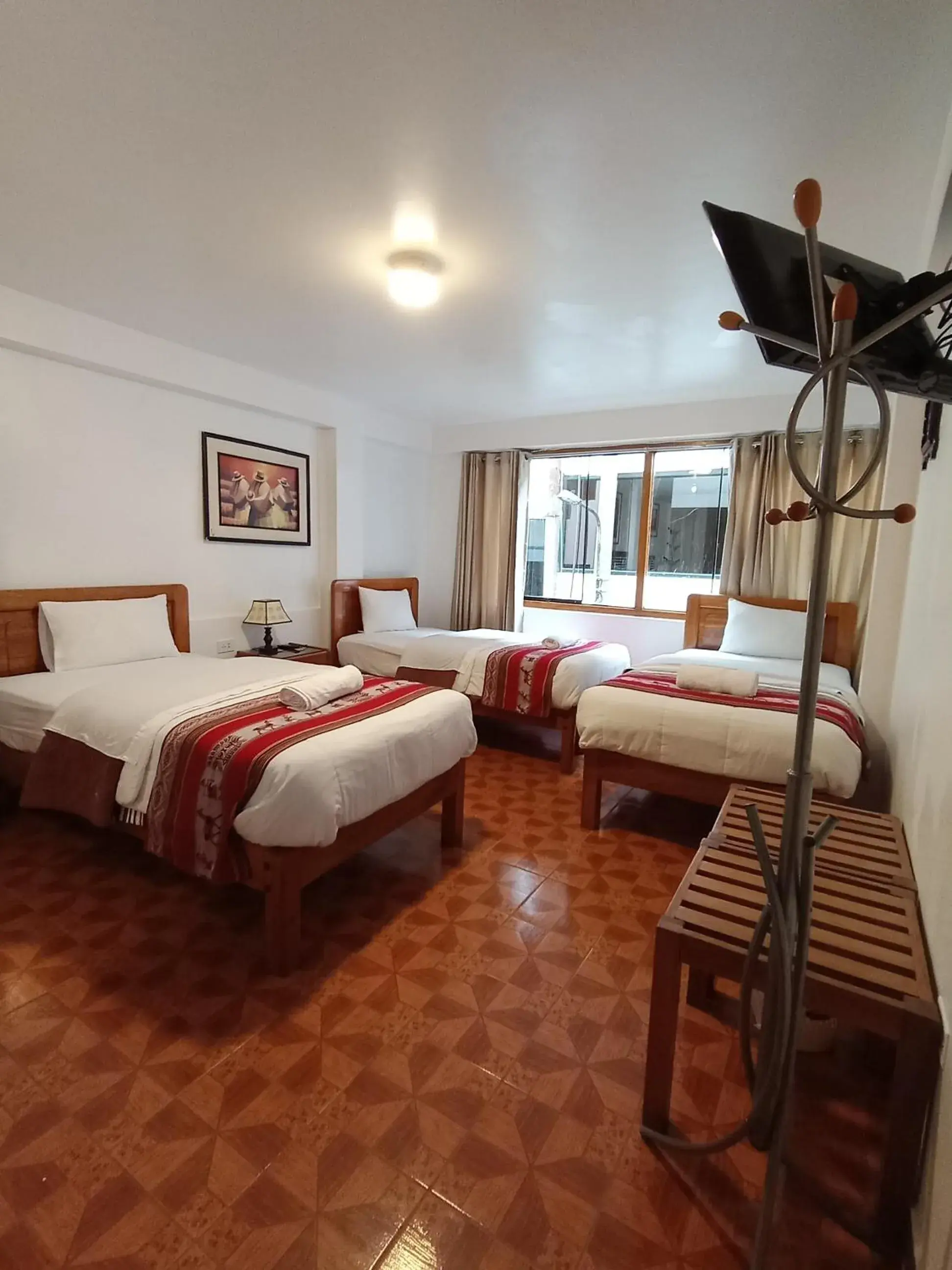 Triple Room in Inka House Hotel Triple Room in Inka House Hotel