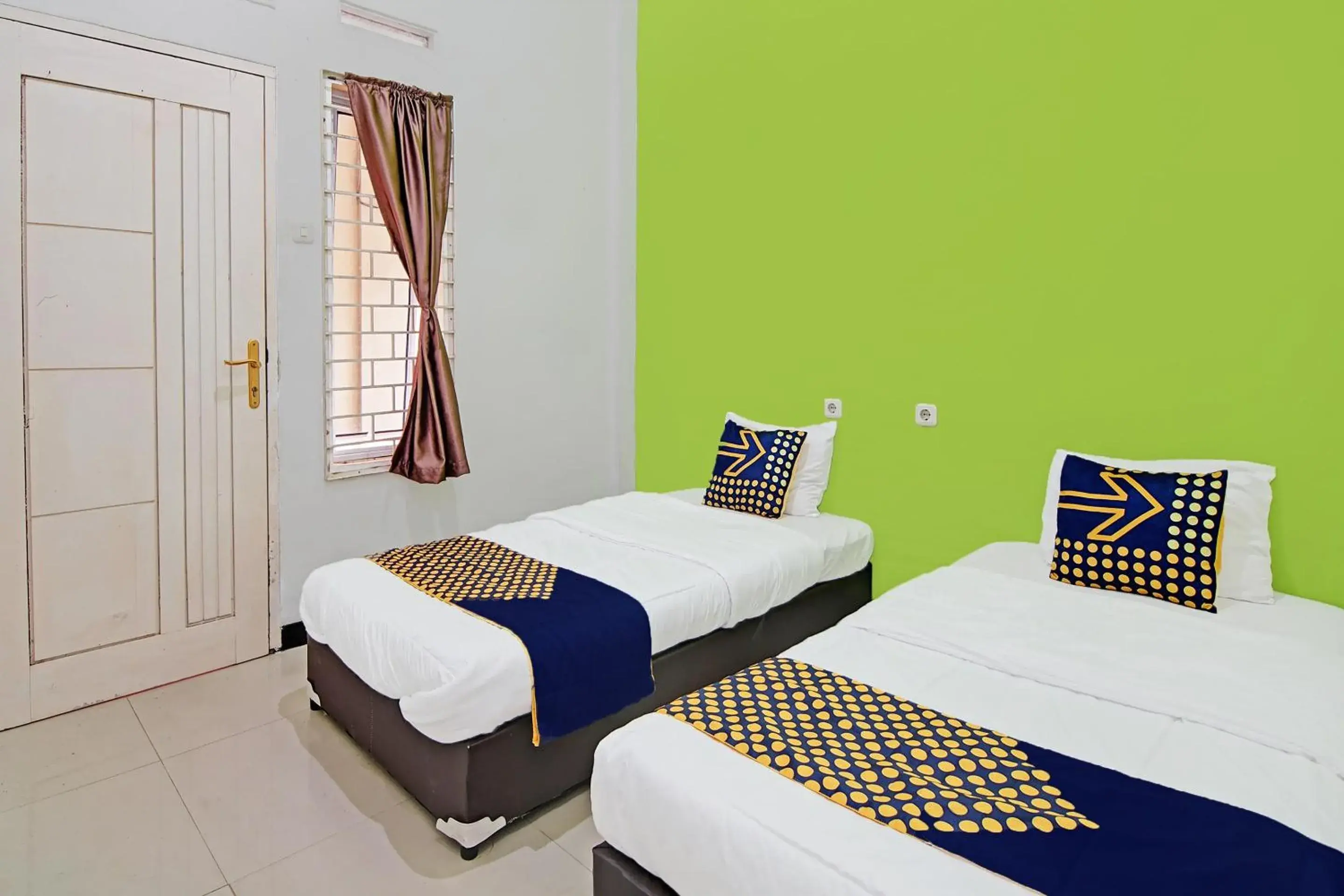 Economy Twin Room in Hotel O Teguh Homestay Syariah Economy Twin Room in Hotel O Teguh Homestay Syariah